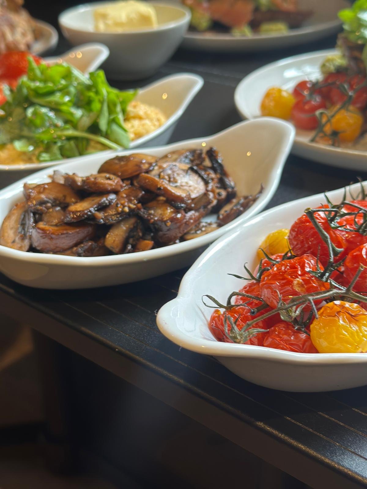 Fresh sides and roasted vegetables at Cosy Cafe and Kitchen