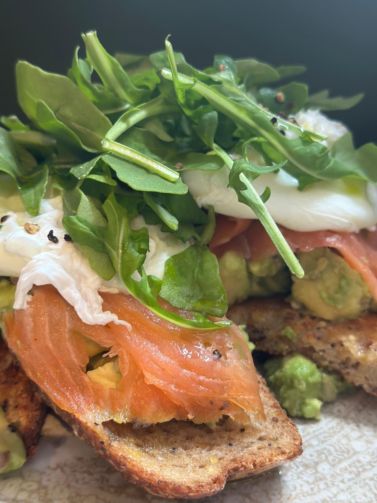 Poached eggs with smoked salmon and avocado at Cosy Cafe and Kitchen